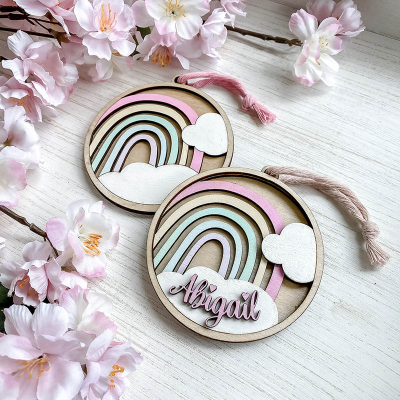 临时夫妻 laser cut wooden ornaments with rainbows and colorful names