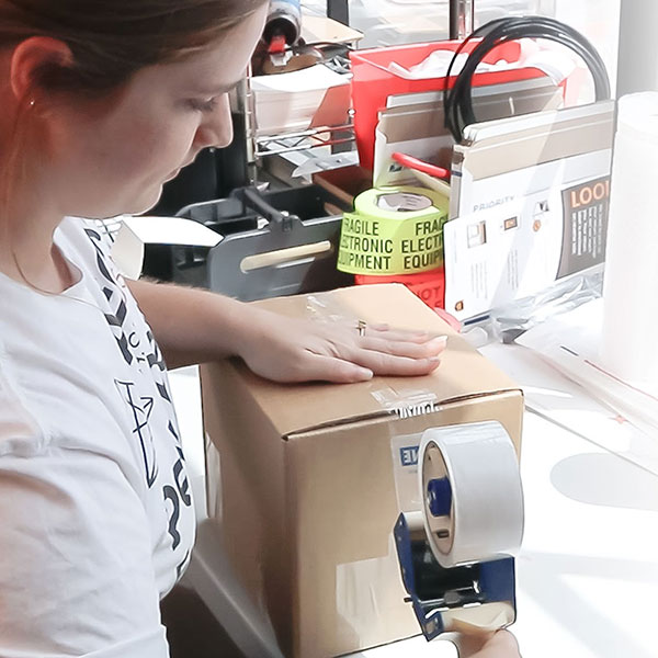 person prepping a package